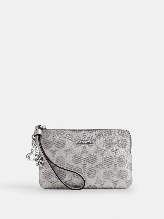 Coach Handbags - NWT NIB Coach Boxed Corner Zip Wristlet In Signature Canvas With Charms
